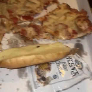 a slice of pizza in a box