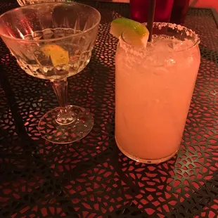 two cocktails on a table