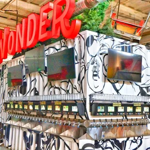 Pour Your Own tap wall at Can Can Wonderland