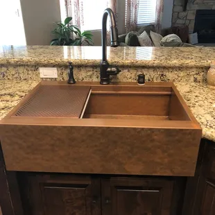 customer had a cracked piece of granite. We had this sink custom made and we saved the granite counter top.