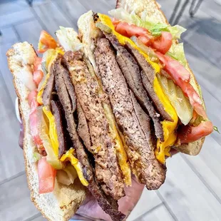 Double 8oz Steakburger With Cheese and gyro/ Instagram @JudeeTheFoodee