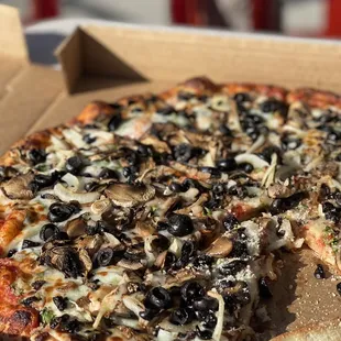 a pizza in a pizza box