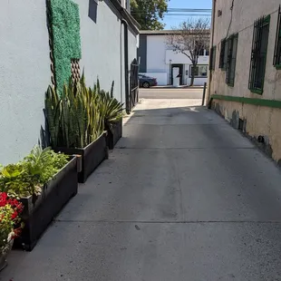 Alleyway to the small parking lot