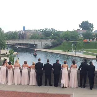 Watching the bride and groom make theirs entrance via the canal