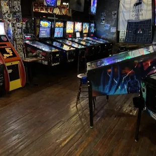 a row of pinball machines