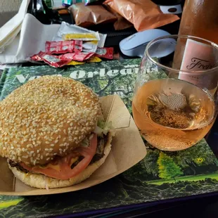 a glass of beer and a sandwich