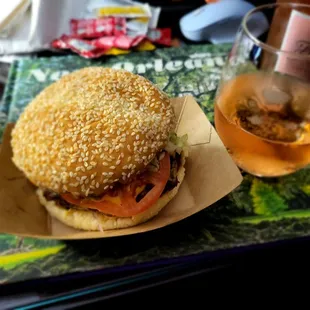 a glass of beer and a sandwich