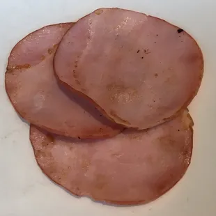 Canadian bacon,; albeit a pretty thin and meager portion.
