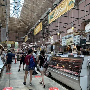 people shopping in a market