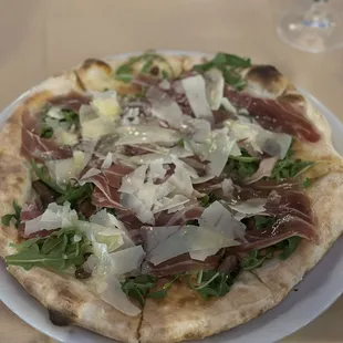 Pizza Christina-  Prosciutto with mushrooms and truffle oil