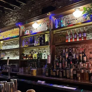 a woman standing at the bar