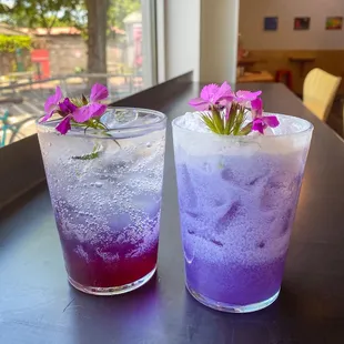 two cocktails on a table