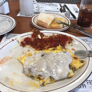 Sausage and cheese omelette with sausage gravy