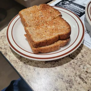 2.99 for a side of toast. Order a meal that comes with toast