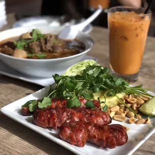 Esaan sausages and beef noodles