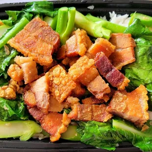 Crispy pork and Chinese broccoli over rice