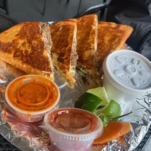 QUESABIRRIA 12&quot; Flour Tortilla, Birria, Mozzarella Cheese, Onions, Cilantro, Pepper, Limes, Carrot, Consome $12