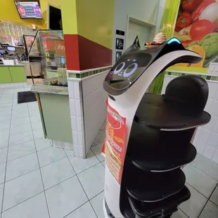 Robot playing mexican music brings the food.  It made me laugh. I'm used to seeing these at the Asian restaurants.