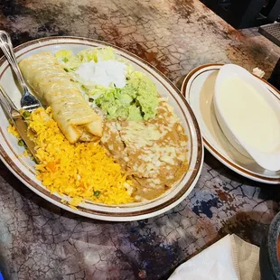 Enchiladas and side of queso