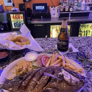 Fantastic fried whole tilapia!  I've cold beer!  Perfection!!