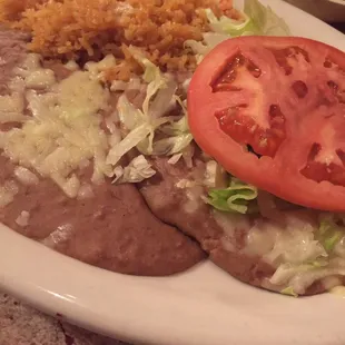 Chalupa with rice and beans  (There is guacamole hiding under the tomato I discovered)