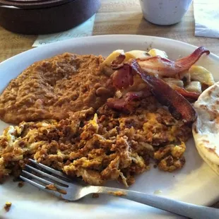 Special of today.Chorizo con huevo, frijoles, papas, tocino y tortillas de harina.All flavorful &amp; a great deal.First time here.