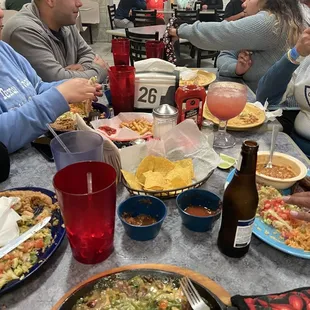 people eating and drinking