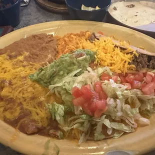 Yellow rice taco pinto beans tortilla