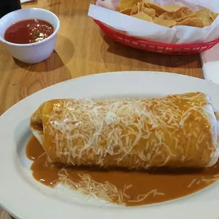 Chicken burrito with brown gravy sauce