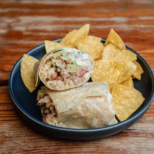 Super Burrito
 Choice of Protein, Whole Beans, Pico de Gallo, Secret Salsa, Mexican Rice, Sour Cream, Jack Cheese &amp; Guacamole.