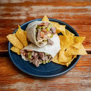 Nopales en Asada burrito.

Carne Asada, Whole Beans, Pico de Gallo, Secret Salsa &amp; Nopales.