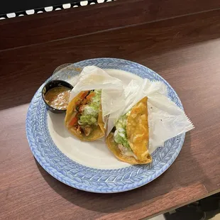 Crispy tacos with pollo asado (chicken)