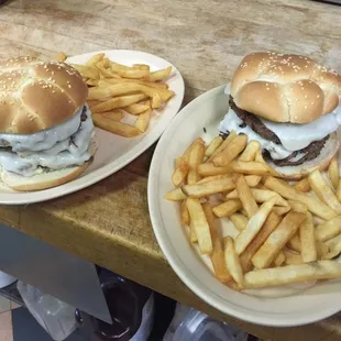 two burgers and french fries