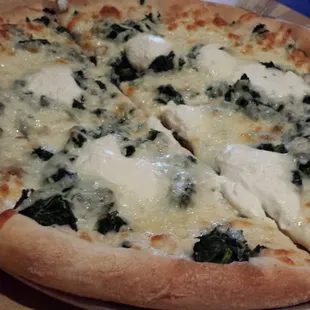 White pizza with spinach