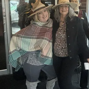 Women in hats  This establishment has a no hat no T-shirt policy posted on their front door guess what women that includes you as well