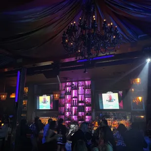 a crowd of people at a party