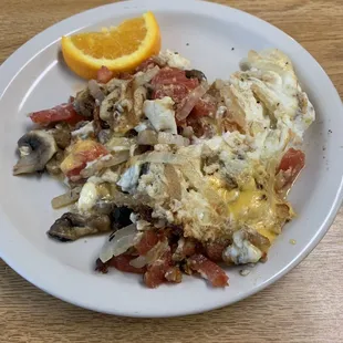 Egg white scramble, with onions, tomatoes, mushrooms and American cheese. This was my own concoction. It was delicious!