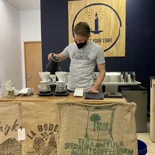 Zach educating us while preparing two unique, high quality coffee&apos;s for my wife and I.  Thanks, Zach