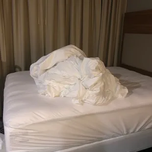 This is what the front desk decides to do with the sheets after they came up to inspect the wet and smelly sheets