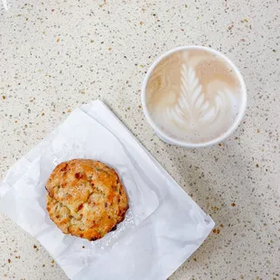 Bacon cheddar scone ($4.50) and 12 oz whole milk latte ($4.50)