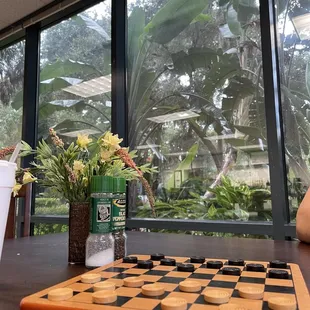Games on the tables and a great tropical view although it was raining.