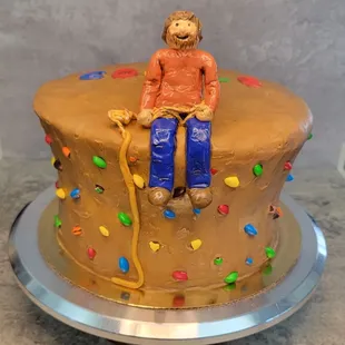 Rock climbing  cake with custom man by @shes.Crafty2