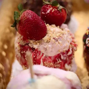 Cotton Candy Apple head Next to our delicious Strawberry Stuffed Cheesecake