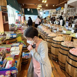 a woman wearing a face mask in a store