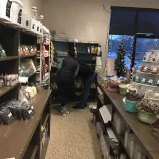 two people in a candy shop