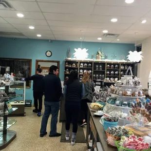 people shopping in a candy shop