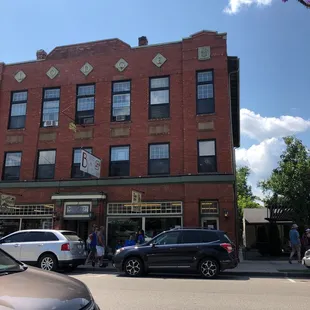 cars parked in front of a building