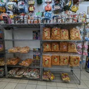a variety of snacks on display in a store