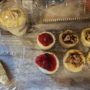 Mini cheesecakes turtle, Twix and Strawberry.  Cream horn and Banana pudding cup. yum!