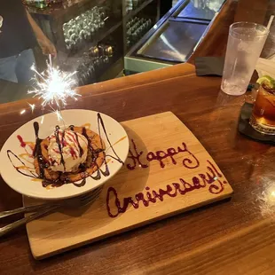 a birthday cake with a sparkler